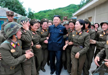 North Korean leader Kim Jong-un (C) visits the Thrice Three-Revolution Red Flag Kamnamu (persimmon tree) Company under the Korean People's Army Unit 4302 in this undated picture released by the North's official KCNA news agency in Pyongyang on August 24, 2012. KCNA did not state precisely when the picture was taken. Kim is seeking an ice-breaking trip to key ally Beijing next month to meet China's outgoing and new leaders, a source with ties to Pyongyang and Beijing told Reuters on Friday. REUTERS/KCNA (NORTH KOREA - Tags: POLITICS MILITARY) THIS IMAGE HAS BEEN SUPPLIED BY A THIRD PARTY. IT IS DISTRIBUTED, EXACTLY AS RECEIVED BY REUTERS, AS A SERVICE TO CLIENTS. NO THIRD PARTY SALES. NOT FOR USE BY REUTERS THIRD PARTY DISTRIBUTORS